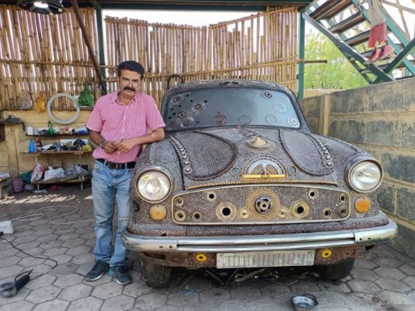 Artist Sundar Gurjar with the ambassador car (Photo/ANI)