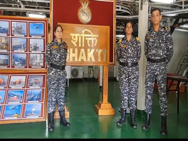 Two Indian Navy women officers deployed on board the tanker warship INS Shakti. (Photo/ANI)