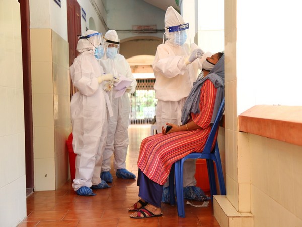 A woman being conducted COVID-19 test on Friday.