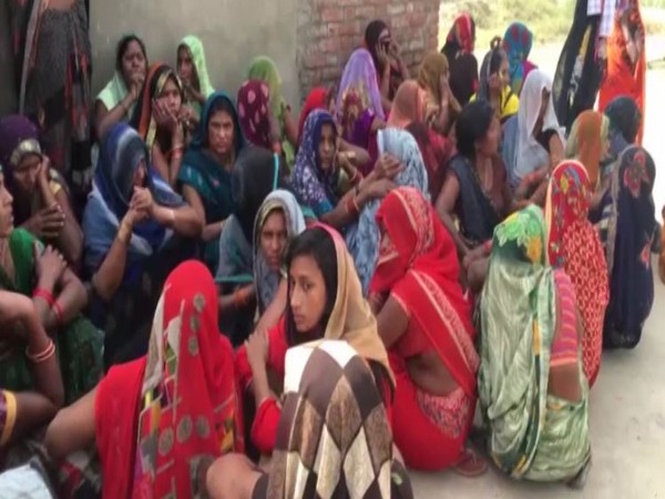Locals, family members of the gathered outside the house (File Photo/ANI)
