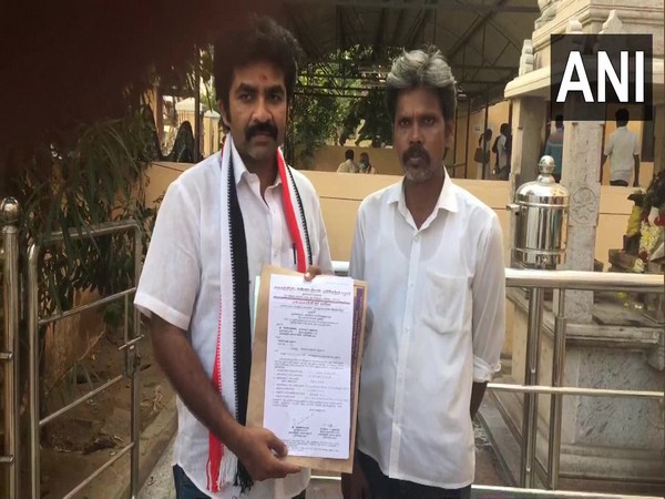 AIADMK candidate Edwin Pabhu. (left in photo)