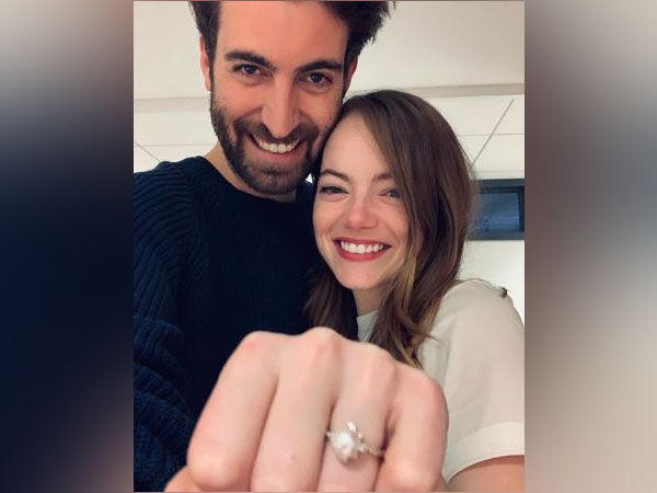 Emma Stone and Dave McCary posing with the engagement ring (Source: Dave McCary's Instagram)
