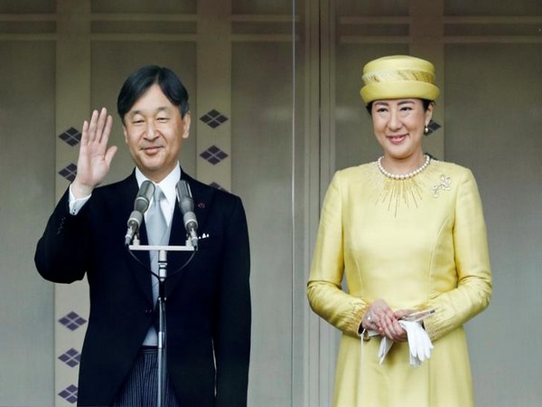Emperor Naruhito and Empress Masako greet well-wishers during their first public appearance at the Imperial Palace in Tokyo in May. (File photo)