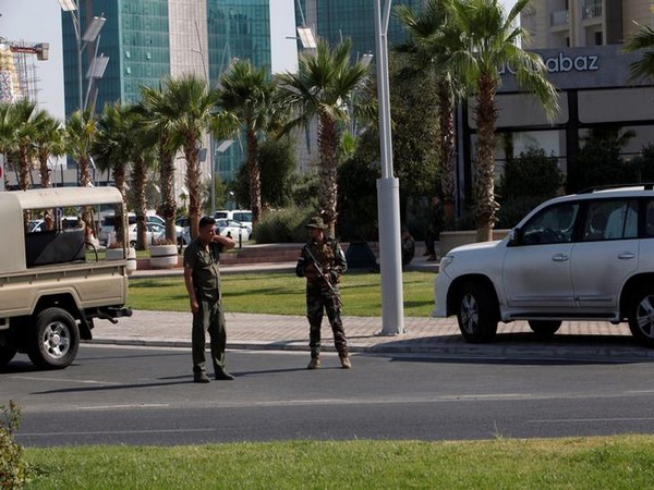 Kurdish security personnel near a restaurant in Erbil where a Turkish diplomat was killed on Wednesday.