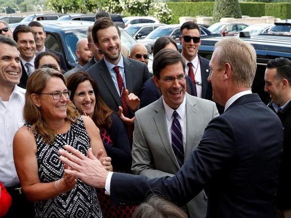 Outgoing US Acting Defence Secretary Patrick Shanahan (R) with his successor Mark Esper (L) in Washington on June 21 (Photo/Reuters)