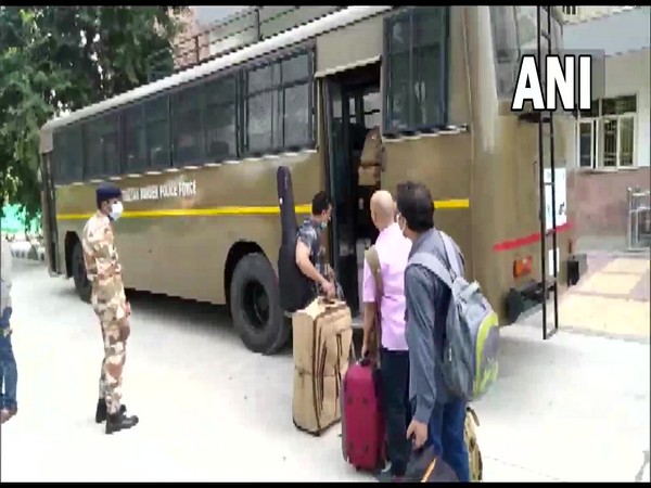 Visuals of evacuees discharged from ITBP Chhawla Camp, New Delhi after 14-day quarantine