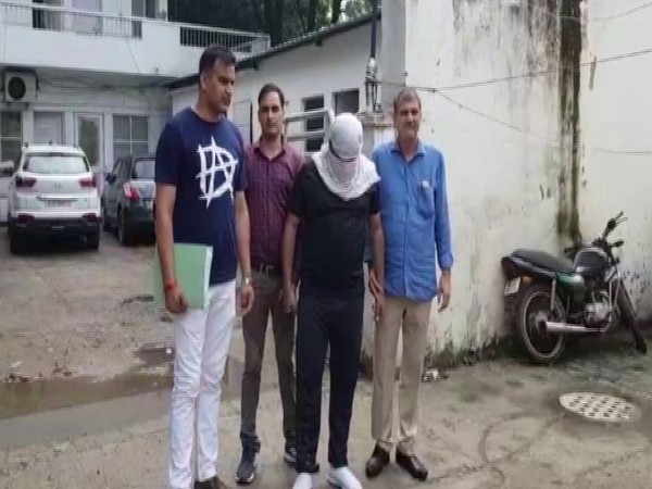 Delhi Police with the accused Rajender Singh Meena on Saturday. Photo/ANI