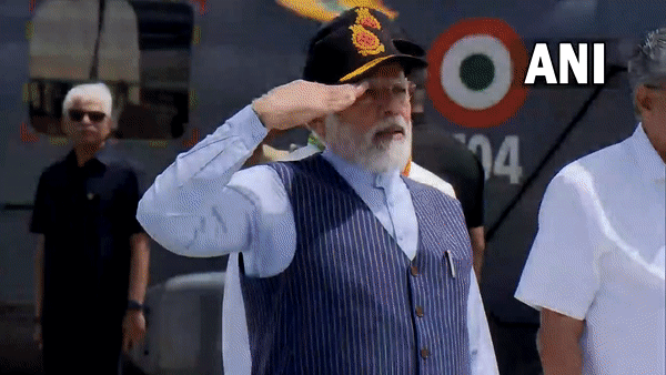 Prime Minister Narendra Modi with Kerala Chief Minister Pinarayi Vijayan during the commissioning of the indigenous aircraft carrier INS Vikrant in Kochi, Kerala. (ANI/photo)