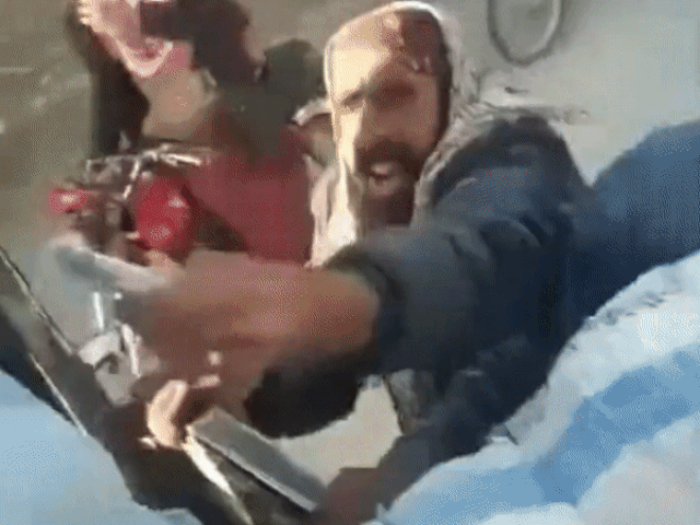 Pakistani citizens chasing wheat truck on their bikes. (Phot credit - Twitter/Sajjad Raja)