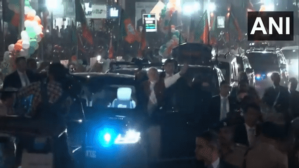 Prime Minister Narendra Modi holds roadshow in Vapi (Photo/ANI)