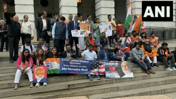 Indian diaspora awaits arrival of Prime Minister Narendra Modi outside Capitol Hill in US. (Photo: ANI)
