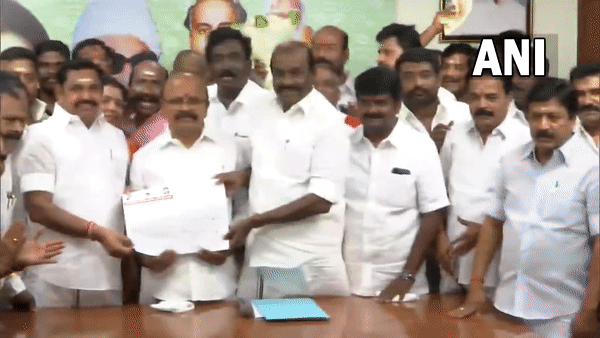 AIADMK general secretary Edappadi Palaniswami's supporters celebrate at the party headquarters in Chennai after Madras High Court rejects interim applications seeking stay on GS polls. (Photo/ANI)