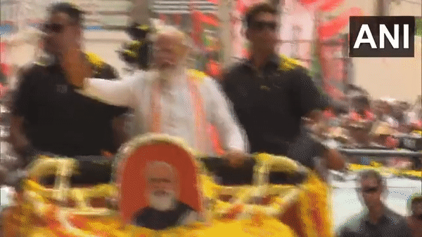 Prime Minster Narendra Modi at the roadshow on Sunday. (Photo/ANI)