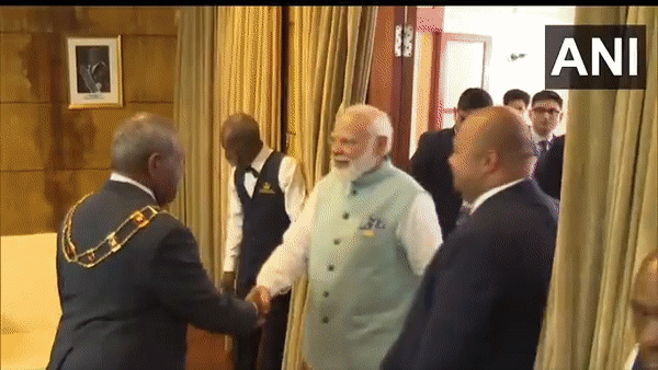 Prime Minister Narendra Modi with Papua New Guinea Governor General Bob Dadae. (Photo/ANI)