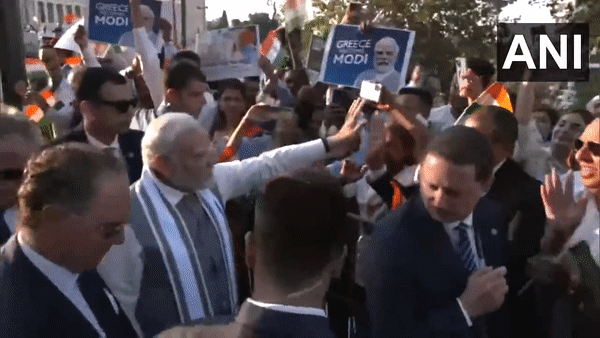 PM Modi interacts with Indian community outside hotel in Athens, Greece (Photo/ANI)