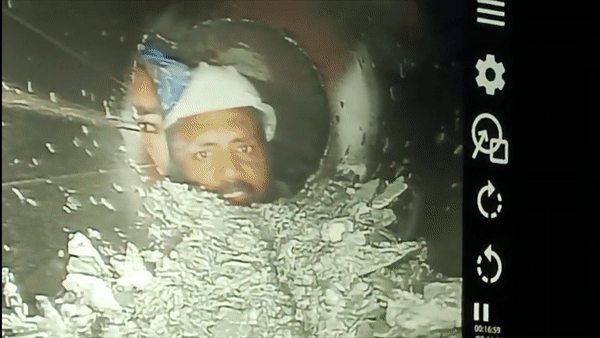 Trapped worked seen in camera through pipeline. (Photo/ANI)