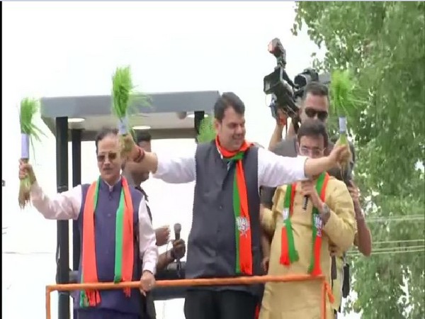 Maharashtra Chief Minister Devendra Fadnavis at a roadshow in Gondia. Photo/ANI