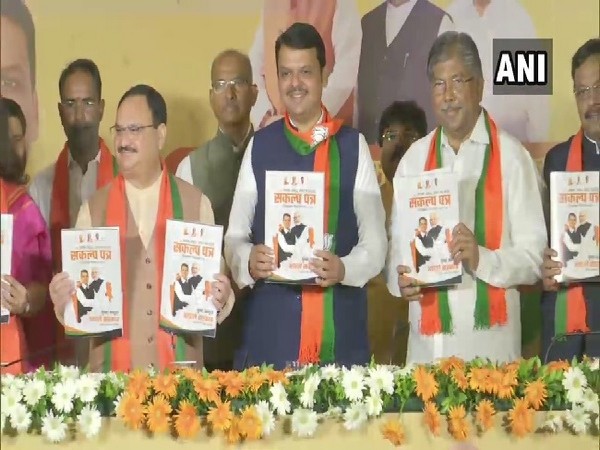 Maharashtra Chief Minister Devendra Fadnavis and BJP Working President JP Nadda releasing the party's election manifesto in Mumbai on Tuesday. (Photo/ANI)