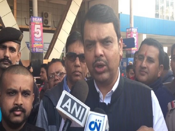 Former Maharashtra Chief Minister Devendra Fadnavis speaking to media in Bagdograi, West Bengal on Tuesday. 