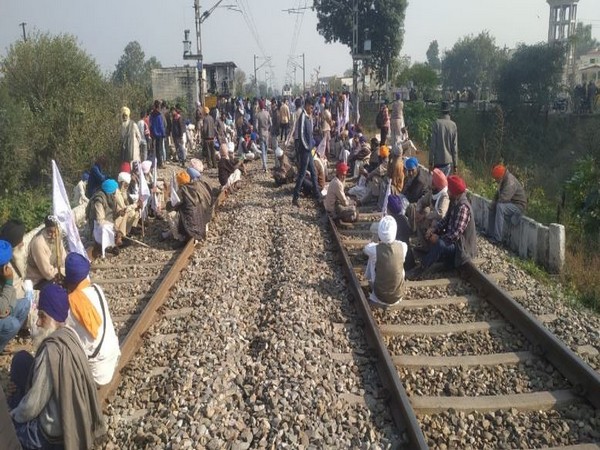 Farmers block railway tracks, demand clearance of sugarcane dues in Amritsar. Photo/ANI