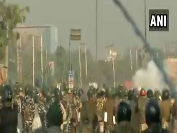 Amid the farmer's 'Delhi chalo' protest march, Police is used tear gas shells to disperse protesting farmers at the Singhu border (Haryana-Delhi border) on Friday.