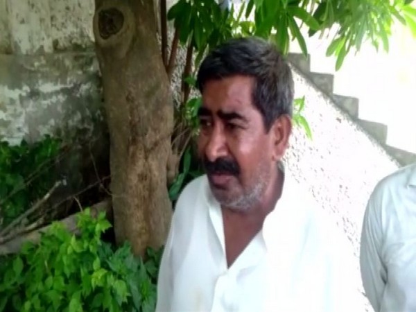 Nandkishore, brother of Devender speaking to reporters in Fatehpur, Uttar Pradesh on Sunday.