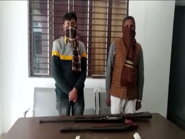 The arrested father-son duo at police station in Rampur. (Photo/ANI)