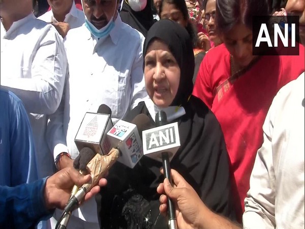 Congress MLA along with her supporters protest outside District Collector's office in Kalaburagi. (ANI/photo)