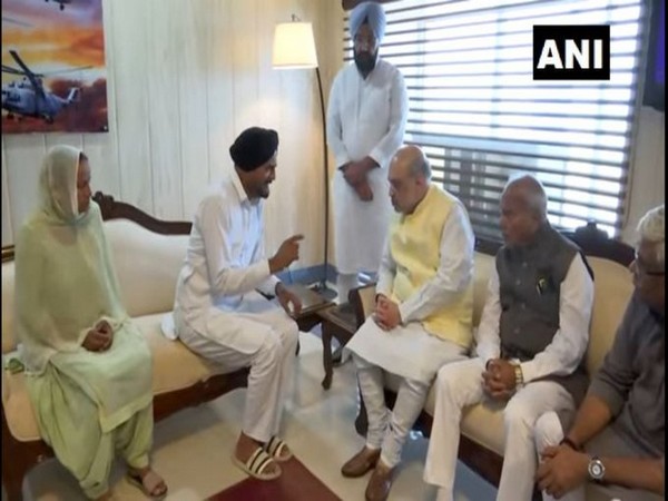 Union Home Minister Amit Shah meets Sidhu Moose Wala's family in Chandigarh on Saturday. (Photo/ANI)