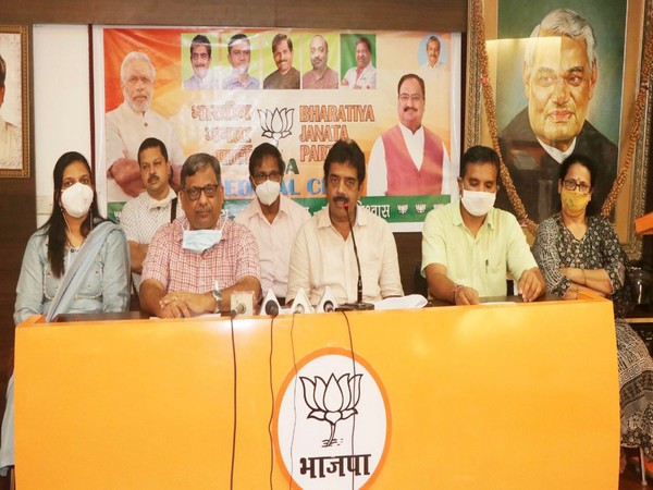 BJP medical cell in-charge Dr Shekhar Salkar addressing a press conference. (Photo/ANI)
