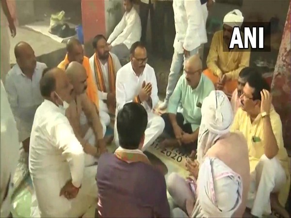 UP Law Minister Brajesh Pathak meeting the families of BJP worker Shubham Mishra and car driver Hari Om (Photo/ANI)