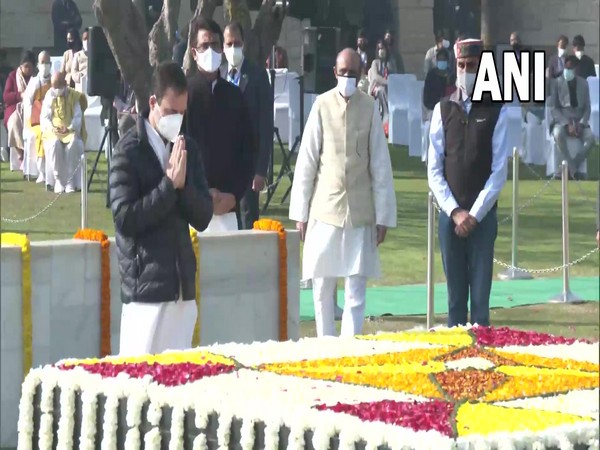 Visual of Congress leader Rahul Gandhi paying homage at Raj Ghat (Photo/ANI)