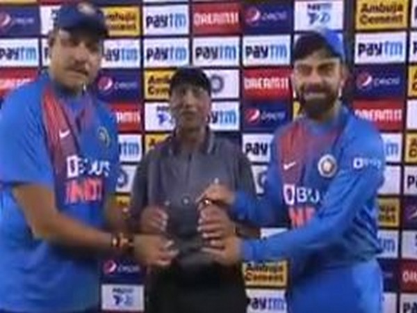 India skipper Virat Kohli and head coach Ravi Shastri felicitate BCCI Chief Curator Daljit Singh here on Wednesday. (Photo/ BCCI Twitter)