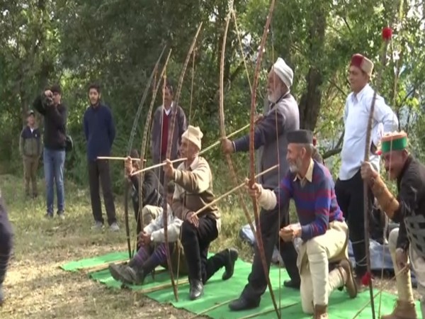 The festival begins with villagers performing prayers and the 'Thoda', a traditional sport of bow and arrow. Photo/ANI
