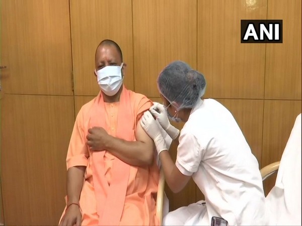 Uttar Pradesh Chief Minister Yogi Adityanath receiving first shot of COVID-19 on Monday.
