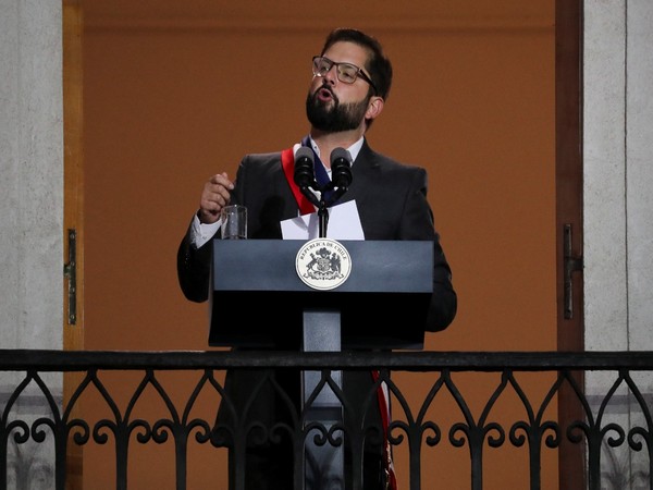 Chile's President Gabriel Boric addresses supporters at La Moneda Palace in Santiago. (Photo credit: Reuters)
