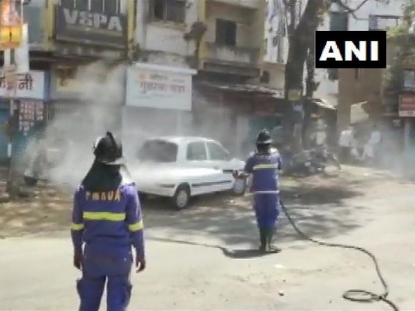 Sanitisation work being done in Pune on Sunday. Photo/ANI