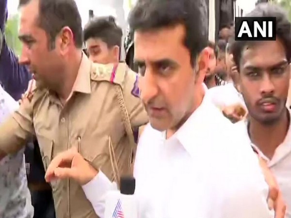 Congress MLA Rizwan Arshad being taken by the police in Bengaluru in Karnataka on Thursday. Photo/ANI