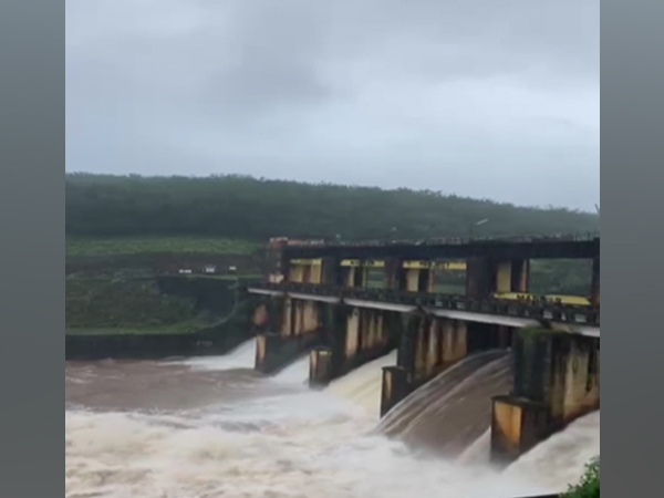 Opened shutters of Maniyar dam (Photo:ANI)
