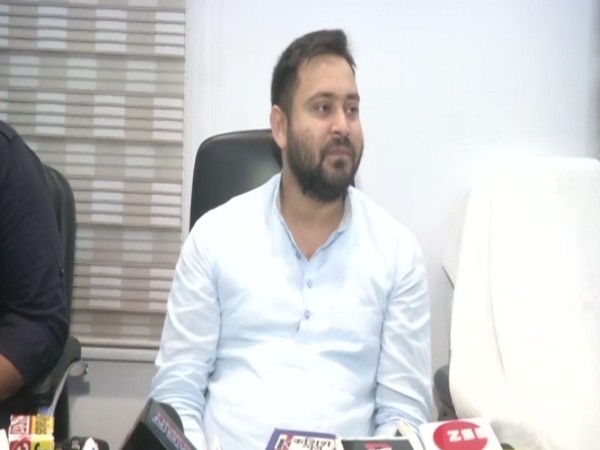 Rashtriya Janata Dal leader Tejashwi Yadav speaking to media  in Patna on Saturday. (Photo/ANI)