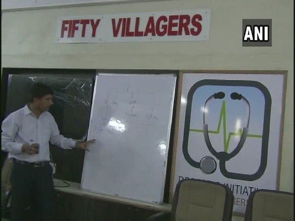 Dr Bharat Saran teaching in his coaching institute Fifty Villagers in Barmer, Rajasthan. Photo/ANI