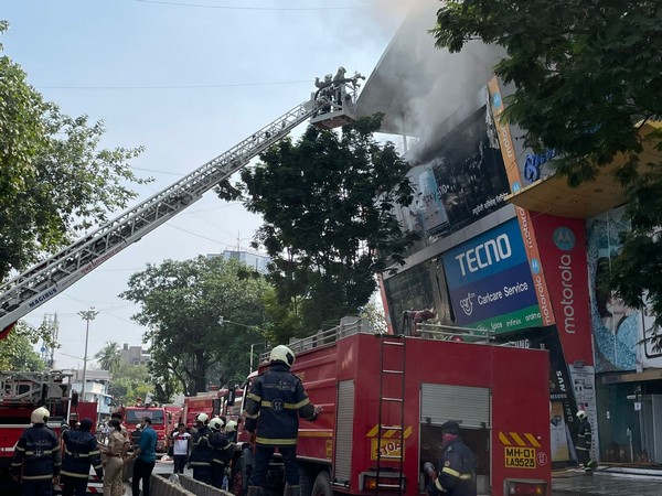 Fire department personnel outside Prime Mall (Photo/ANI)