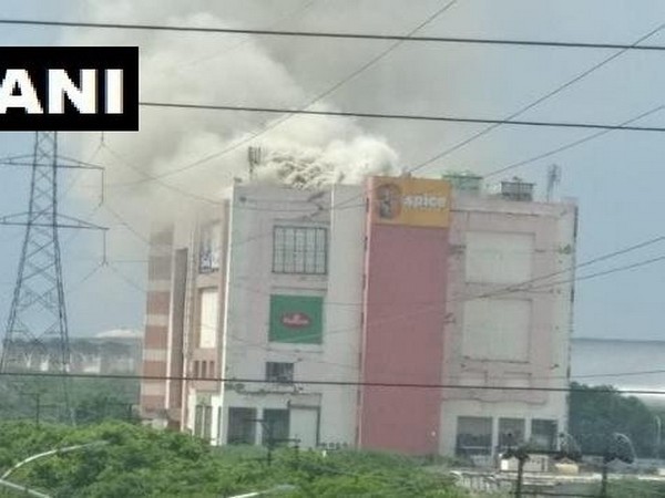 Visuals of heavy smoke billowing from Spice Mall on Monday. Photo/ANI