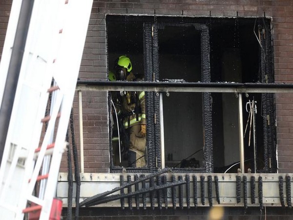 Firefighters work at the building where a fire broke out in Barking, London, Britain, on Sunday. (Photo/Reuters)