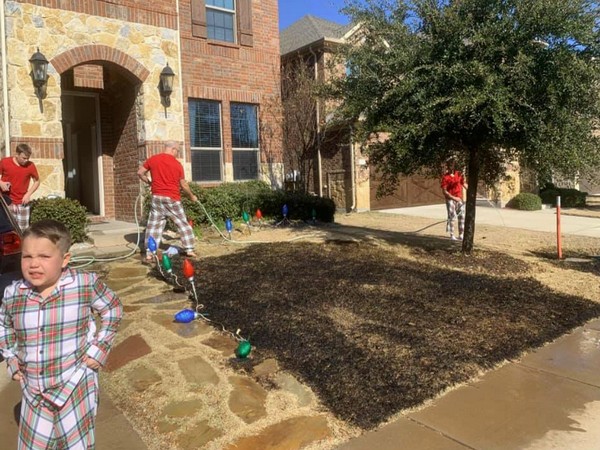 The Facebook photos and a video showed the couple working hard to douse the burning front yard (Picture Courtesy: Facebook)