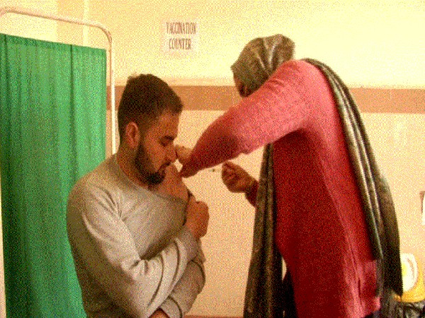 A doctor administering vaccine dose to a beneficiary in J-K's Poonch (Photo/ANI)