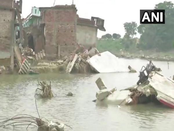 Around 50 houses in the Naruar village in the Madhubani district of Bihar were destroyed due to flood on Tuesday. Photo/ANI