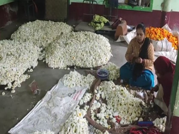 Women making garlands (Photo/ANI)