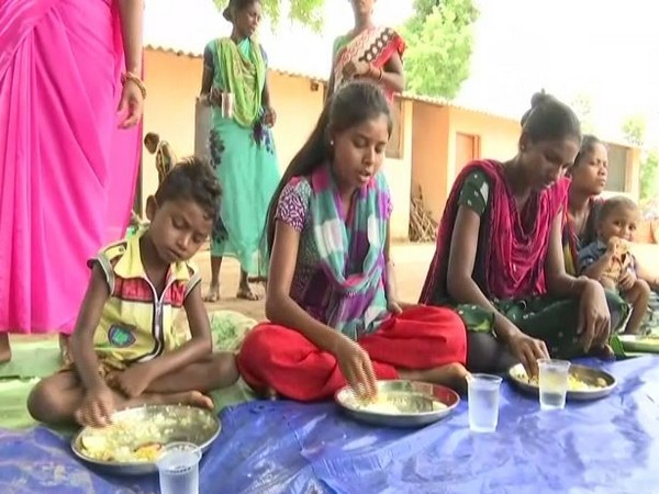 Food being served at an Anganwadi centre in Ganjenar village. Photo/ANI