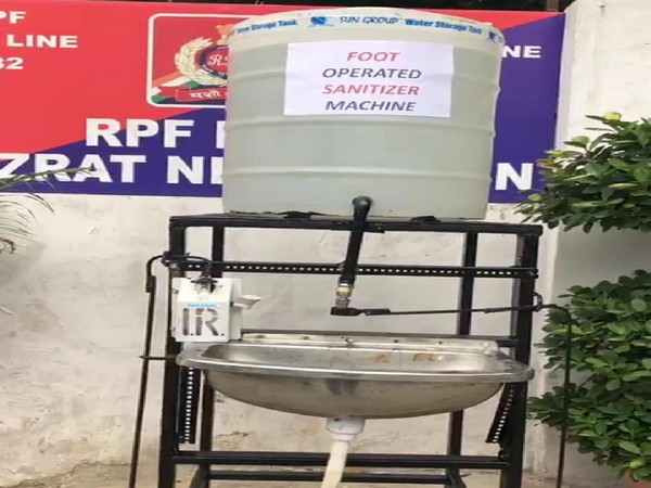 Foot-operated sanitiser machine at Nizamuddin RPF Post, New Delhi. Photo/ANI